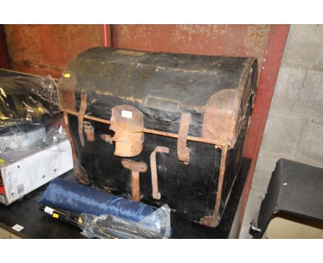 A dome topped travelling trunk