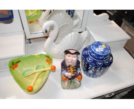 A blue &amp; white jar and cover with character mark to the base, a Melbaware character jug, a Jardiniere in a form of a swan