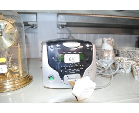 A Roberts alarm clock with radio and cd player
