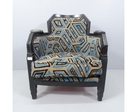 A French Art Deco tub lounge chair with ebonised frame, later reupholstered.Good overall condition. Ebonising poor to frame, 