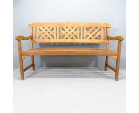 A stained teak garden bench. 146x87x64cm. 