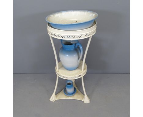 A vintage metal washstand with ceramic jug and bowl. 44x81cm 