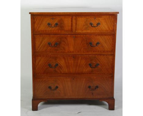 GEORGIAN STYLE FIGURED MAHOGANY AND BOXWOOD LINE INLAID CHEST OF DRAWERS, the oblong crossbanded top above a flame cut front 