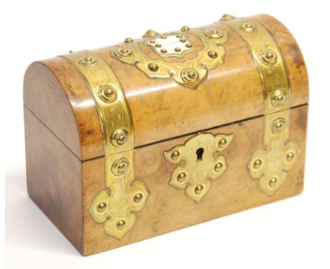 VICTORIAN BURR WALNUTWOOD AND STUDDED BRASS MOUNTED DOME TOP TEA CADDY, with ivorine inset shield shaped cartouche to the lid