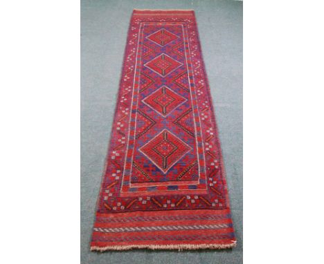 MESHWANI EATERN HAND KNOTTED WOOLLEN RUNNER PRINCIPALLY WINE RED AND MIDNIGHT BLUE WITH FOUR DIAMOND SHAPED MEDALLIONS, FLORA