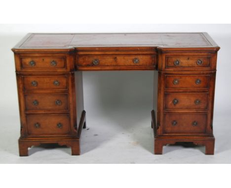 GOOD QUALITY EARLY GEORGIAN STYLE BURR WALNUTWOOD TWIN PEDESTAL DESK, the moulded inverse breakfront top with gilt tooled red