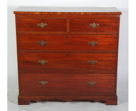 EARLY  NINETEENTH CENTURY MAHOGANY CHEST OF DRAWERS, the moulded oblong top above two short and three long graduated and cock
