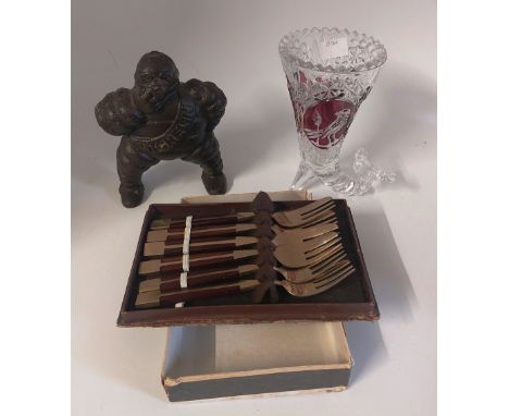 A boxed plated fish fork set, and a ruby and clear glass cornucopia vase , decorated with birds and a glass bird sat on the t