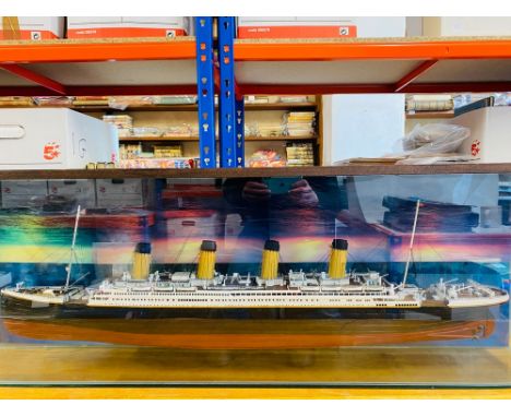 RMS Titanic. A wooden, kit-built, hand-painted 1/250 scale model, 2001, 95cm long, constructed from the 100-part Hachette pub