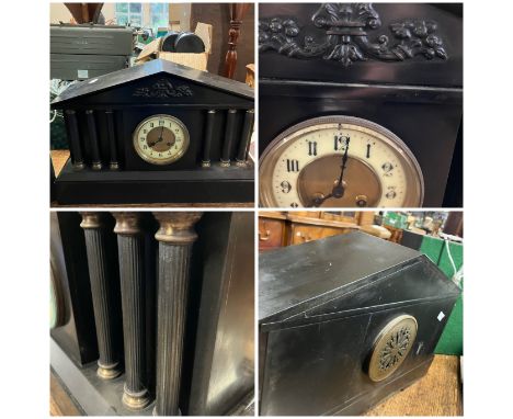 A slate mantle clock.