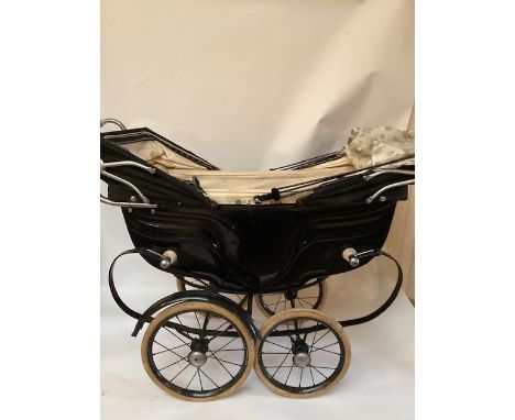Silver Cross dolls carriage pram 1955 twin model with twin hoods &nbsp;and a recovered sun canopy frame to fit . The pram has