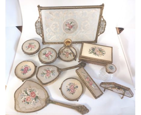 A group of Brass / gilt metal, embroidered dressing table accessories. To include a lace filigree and embroidered tray , mirr