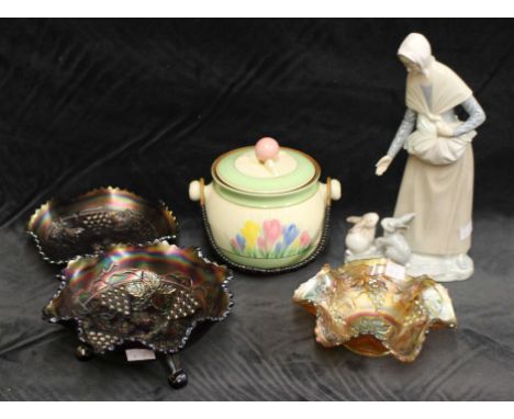 A Clarice Cliff crocus pattern biscuit barrel and cover, a Nao figure of a girl with rabbits and three carnival glass bowls&n