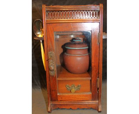 Smokers Cabinet with ceramic tobacco jar and gold gilted sterling silver spoon with yellow enamel decoration.