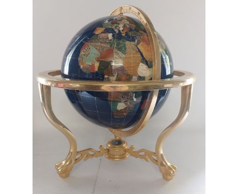 A Large remarkable quality fine weighted 40 " circumference table top rotating stand globe, on brass ball and claw feet with 