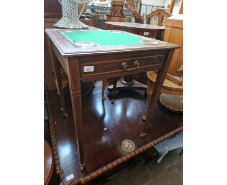 An Edwardian inlaid mahogany card table. 