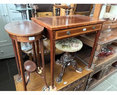 An Edwardian inlaid mahogany side table, a corner cabinet and an Edwardian inlaid mahogany two tier table.