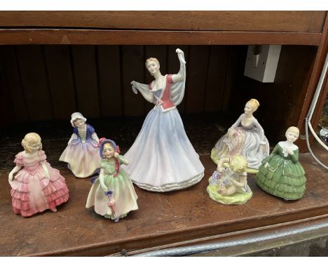 A box containing 7 figurines. Royal Doulton June HN2991 (AF); Dinky Doo HN1678; Rose HN1368; Belle HN2340; Babie HN1679; Rena