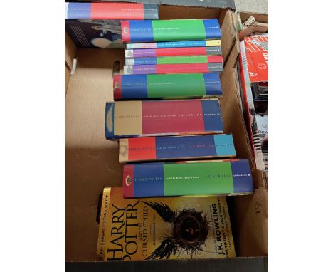 A box of Harry Potter books. 