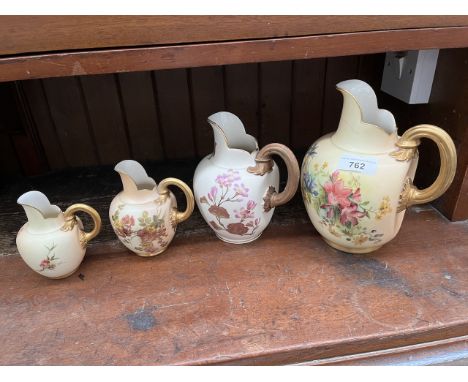 Four Royal Worcester blush ivory graduated jugs bearing pattern number 1094. Largest jug appx 19cm in height, shows various c