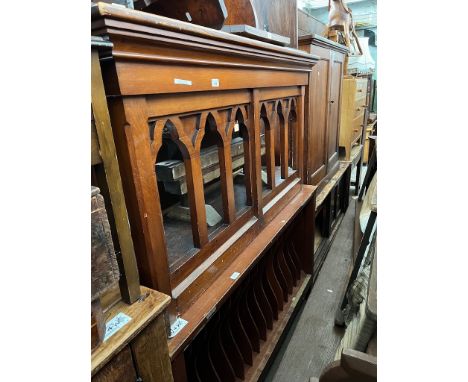 Various items of furniture; a Gothic style mahogany console table, wall sconces, bench, side cabinet with dividers, etc. 