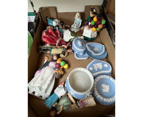 A box of assorted ornaments including Royal Doulton figures, Hummel and Wedgwood.Condition (Wedgwood vase with goats heads on