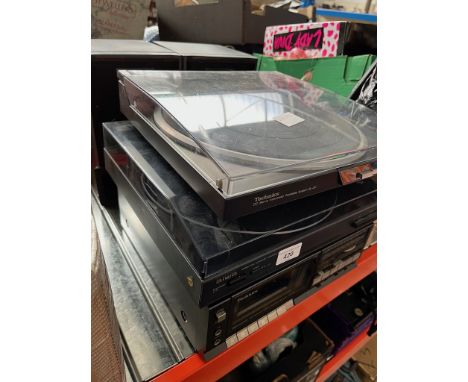 A Technics record deck, an Aiwa record deck, a Technics Radio Cassette Player and two Technics Speakers 