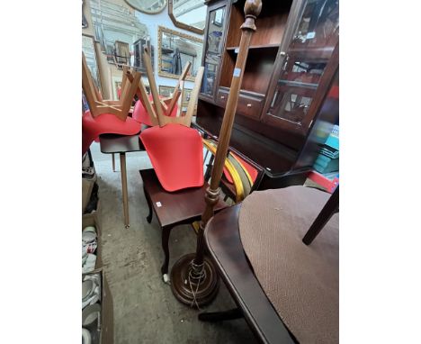Two mirrors, a standard lamp and an occasional table. 