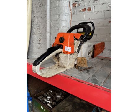 A Stihl petrol chainsaw. 