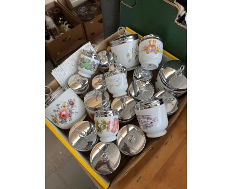 A box containing 20 Royal Worcester egg coddlers, all with black backstamps. 8 small, 9 medium, and 3 large. Various designs 