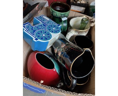 A box of various ceramics to include Poole Pottery, Carltonware, West German vase and Tolston, etc. 