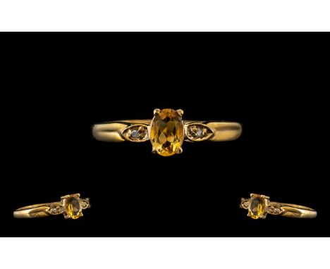 9ct Gold Garnet and Diamond Ladies Ring. Ladies Garnet Set Dress Ring Flanked with Diamond Either Side. 