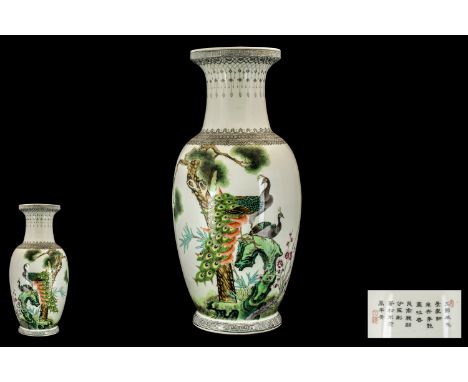 Large Chinese Republic Period Famille Rose Decorated Vase depicting peacocks sitting on tree trunks; fully signed with red se