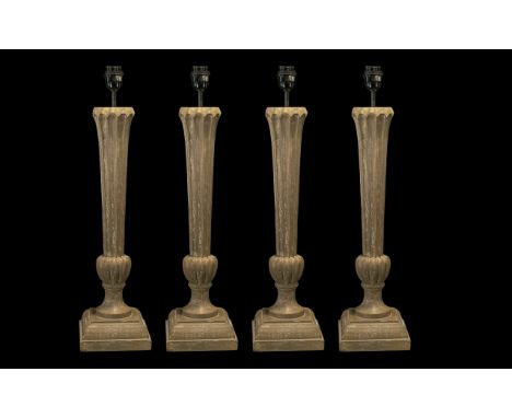 Collection of Four Modern Table Lamps, manufactured by Oka, or classical fluted columns in a stone.  Each lamp height 25".