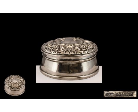 Silver Trinket/Jewellery Box fully hallmarked for Birmingham, decorated with foliage and with a vacant cartouche.  Nice condi