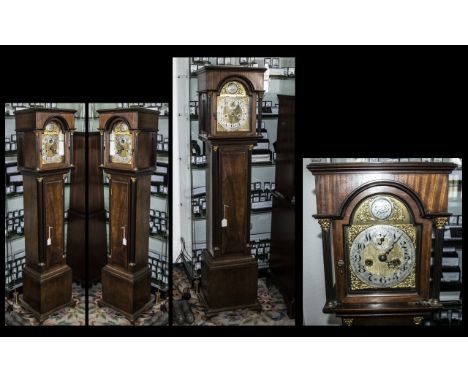 Edwardian 'Granddaughter' Long Case Clock with a 7.5 inch brass arched dial, silvered chapter ring with brass spandrels, maho