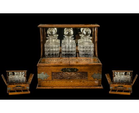 Victorian Period  - Superb Oak Tantalus with Three Cut Glass Decanters, Fitted Games Departments and Press Button Hidden Draw