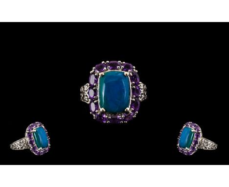 Opalina and Amethyst Halo Ring, a 4.6ct rectangular cushion cut of opalina, the rare, natural mix of blue and green opal, fra