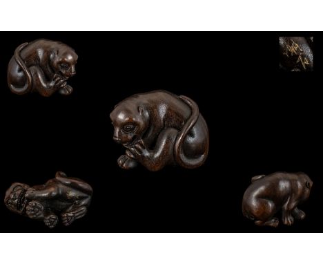 A Japanese Carved Boxwood Netsuke In The Form of a Tiger, Excellent Condition In All Aspects, Signed to Base. Height 3.5 cm. 