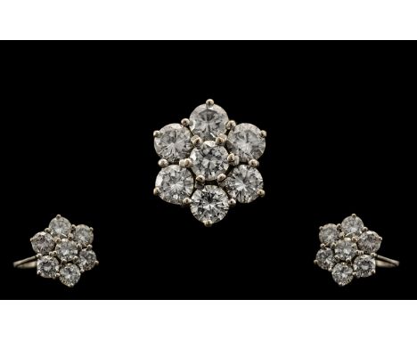18ct White Gold - Superb Quality Diamond Set Cluster Ring - Flower head Design. Marked 18ct. The Seven Round Brilliant Cut Di