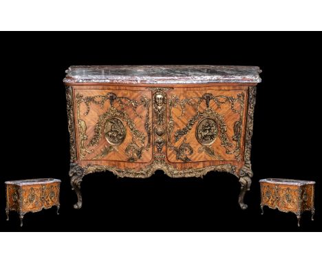 Large and Impressive Kingwood French Style Serpentine Commode Cabinet, the shaped sides adorned with floral swags, with a cen