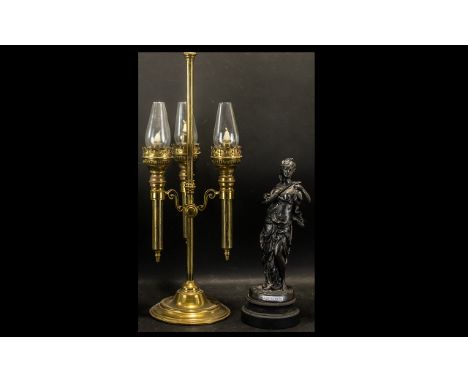 A Three Branch Brass Candle Lamp in the form of a Victorian Oil Lamp, of decorative form, with glass shades.  Height 24".  To