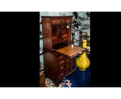 A 20th Century Ladies Writing Desk full front with fitted interior above three graduating drawers on bracket feet.  Height 53