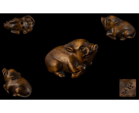 A Japanese Carved Boxwood Netsuke In The Form of a Wild Boar, Excellent Condition In All Aspects. Signed to Base, Height 3.5 