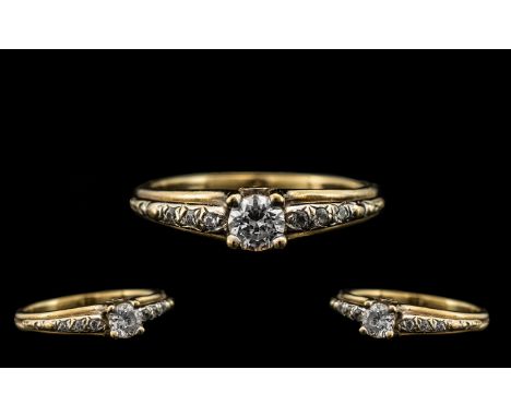 9ct Gold Dress Ring with Centre Stone, Flanked by Stones on Shoulders. Please See Image. Ring Size - K. 