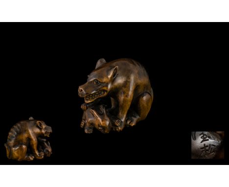 A Japanese Carved Boxwood Netsuke In The Form of a Starving Wolf. Excellent Condition In All Aspects, Signed to Base. Height 