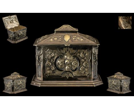 Victorian Sarcophagus Shape Silvered Metal Lidded Tea Caddy with embossed floral decoration and with lockplate; c1860s/80s; 7