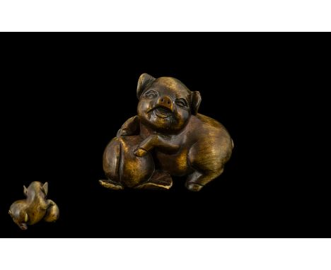 A Japanese Carved Boxwood Netsuke In The Form of a Pig Frolaking with Fruit, Excellent Condition In All Aspects, Please See P