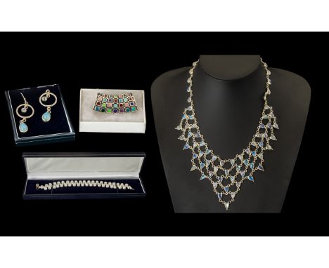 Collection of Ladies Contemporary Jewellery,  boxed, comprising:  a three strand pearl bracelet; a pair of silver toned Scand