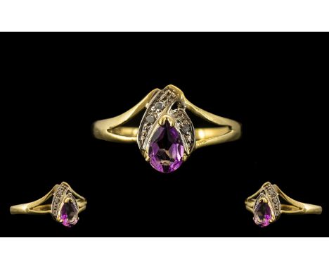 9ct Gold Amethyst and Diamond Set Ring, Set with Pear Shaped Amethyst, Flanked with Diamonds. Please See Photo. 
